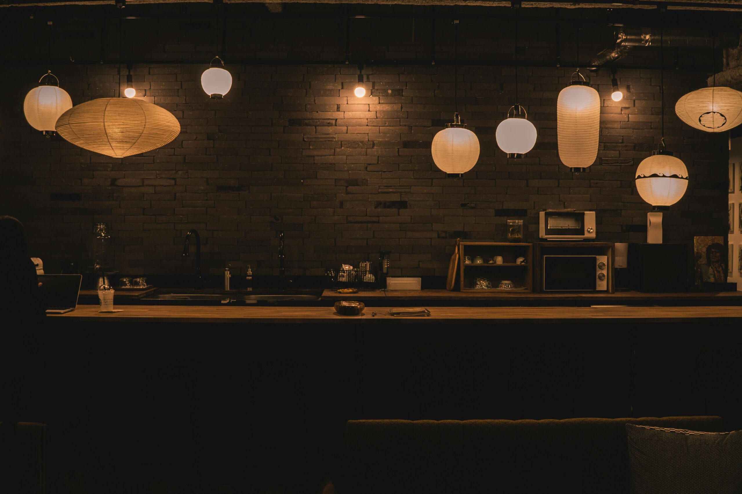 Secret Supper Clubs : A home kitchen transformed into a private dining venue with creative culinary presentation.