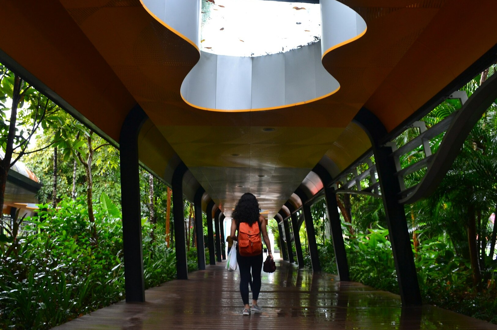  A woman strolls along a walkway, representing a journey perfect for all kinds of travelers.